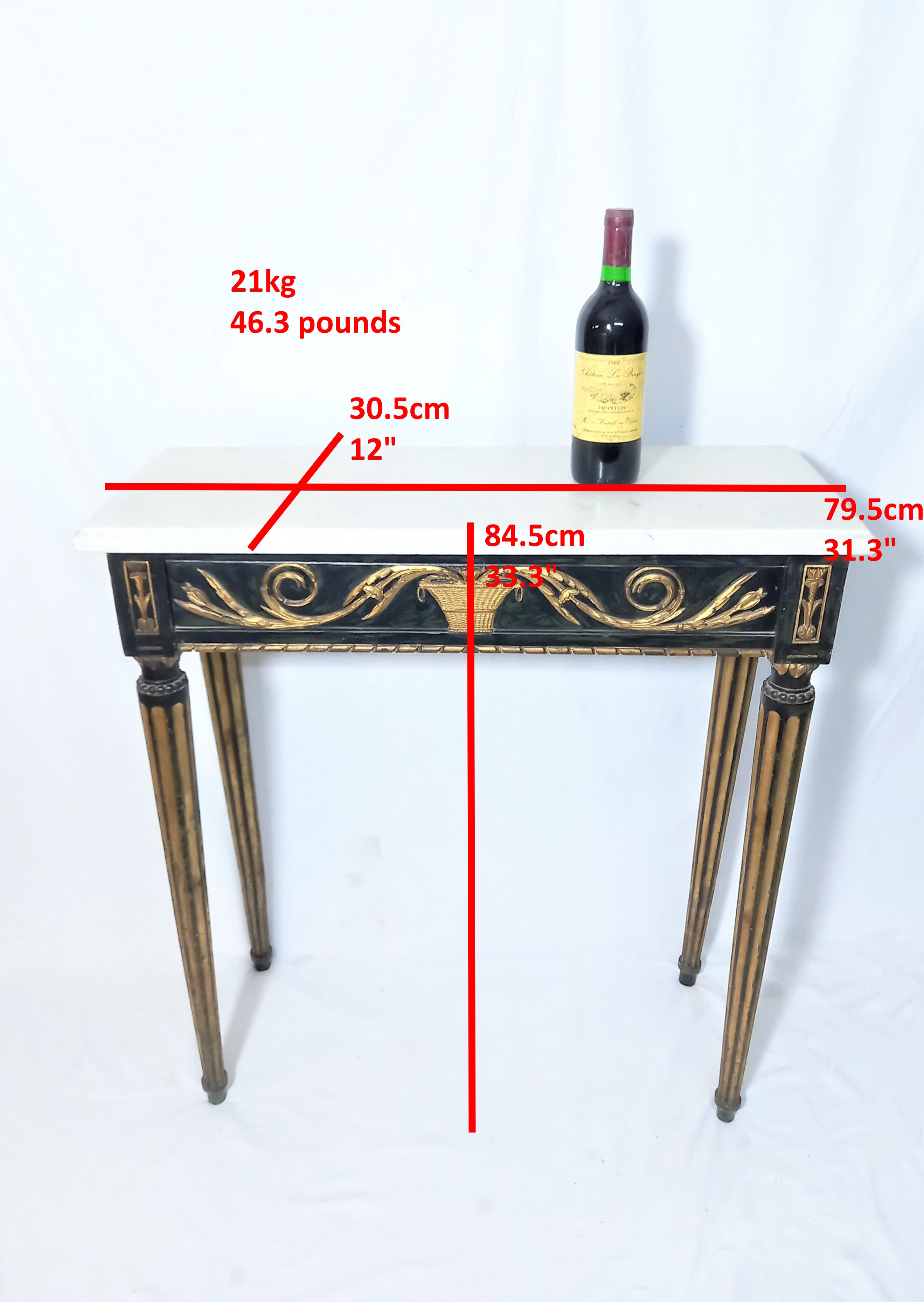 19th century Louis XVI style console table in black and gold with white marble shelf
