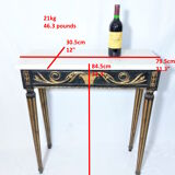 19th century Louis XVI style console table in black and gold with white marble shelf