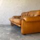 Two seats leather sofa, by Tobias Scarpa