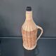 Wicker bottle with handle
