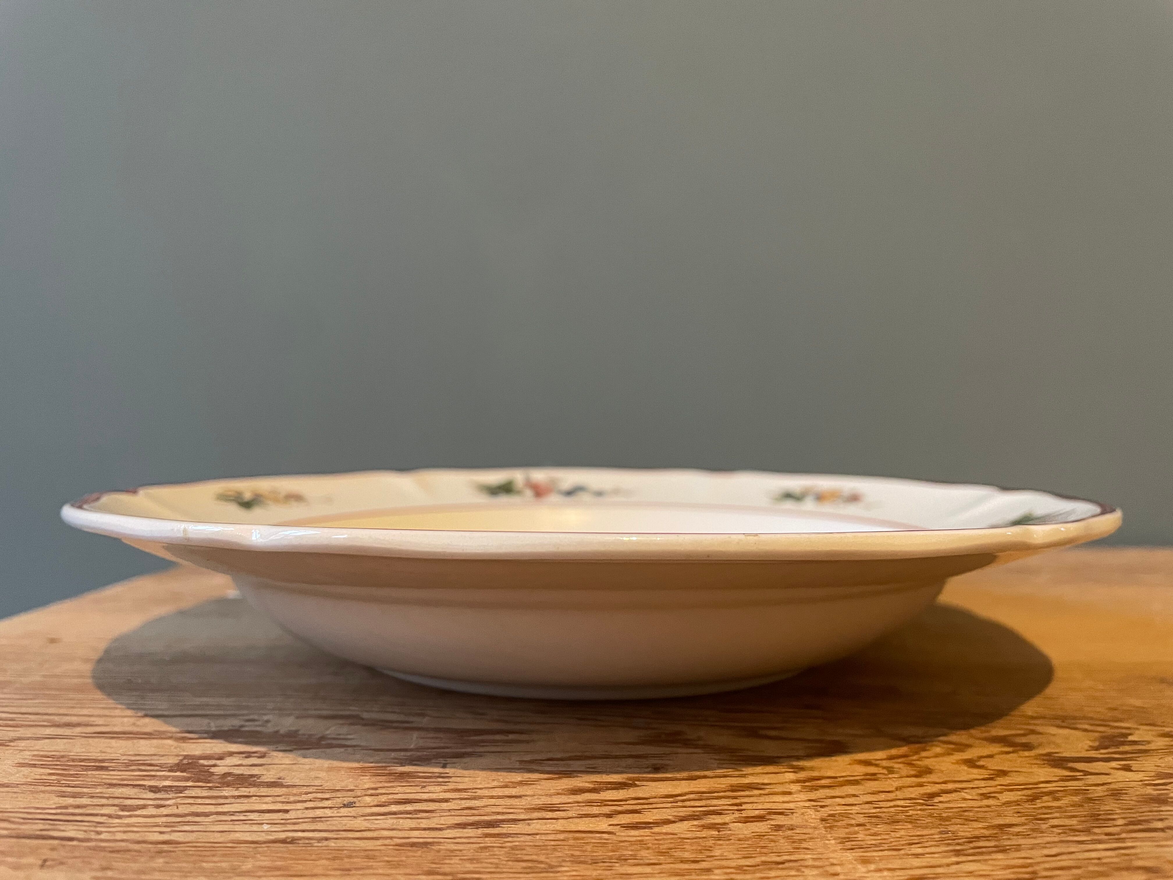 Set of 12 Villeroy and Boch hollow plates, model "Phoenix"