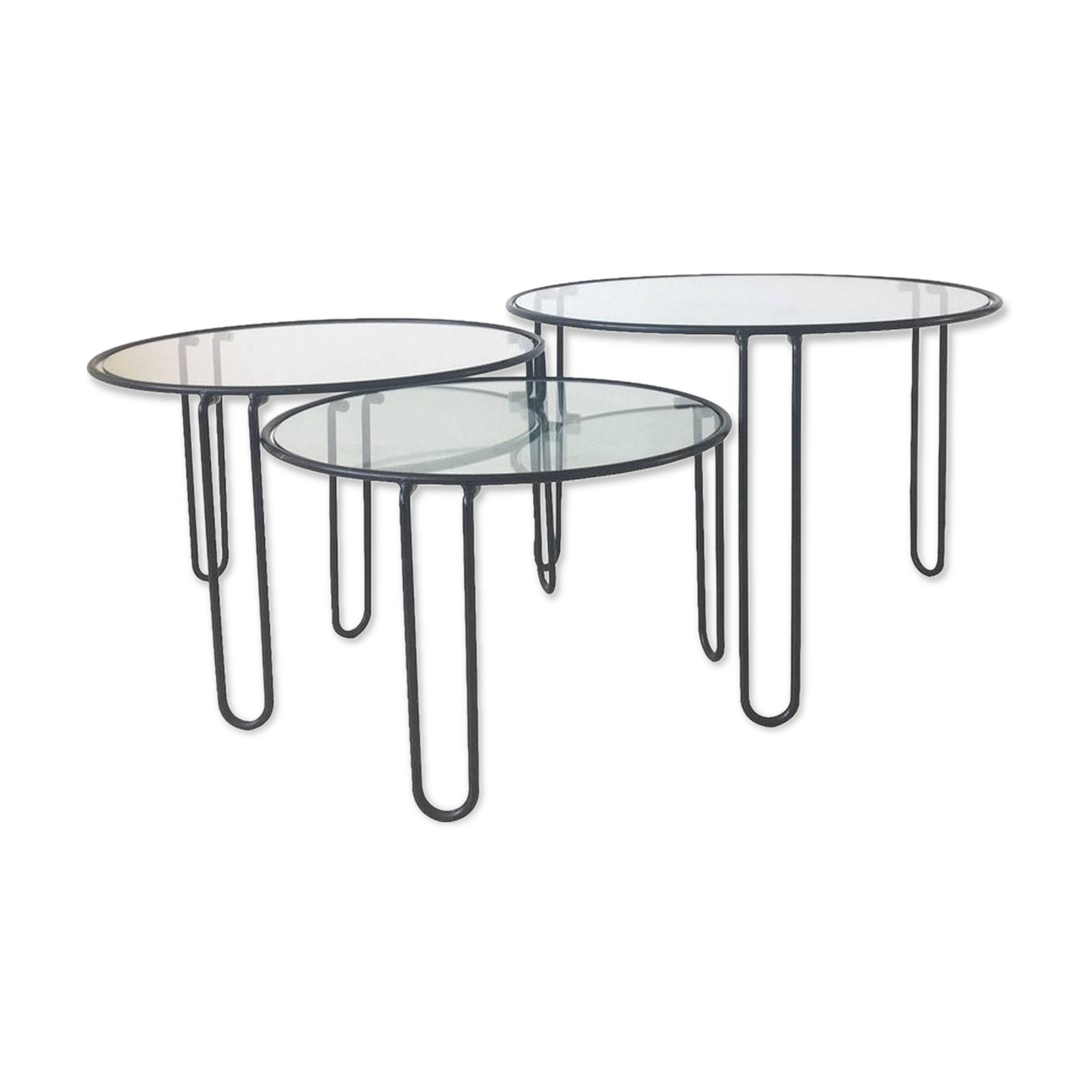Set of three coffee tables black glass in the middle of the century with legs and metal hairpin