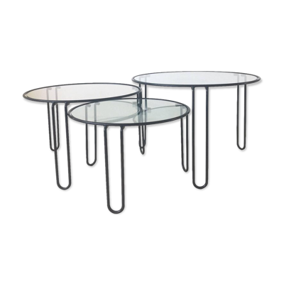 Set of three coffee tables black glass in the middle of the century with legs and metal hairpin