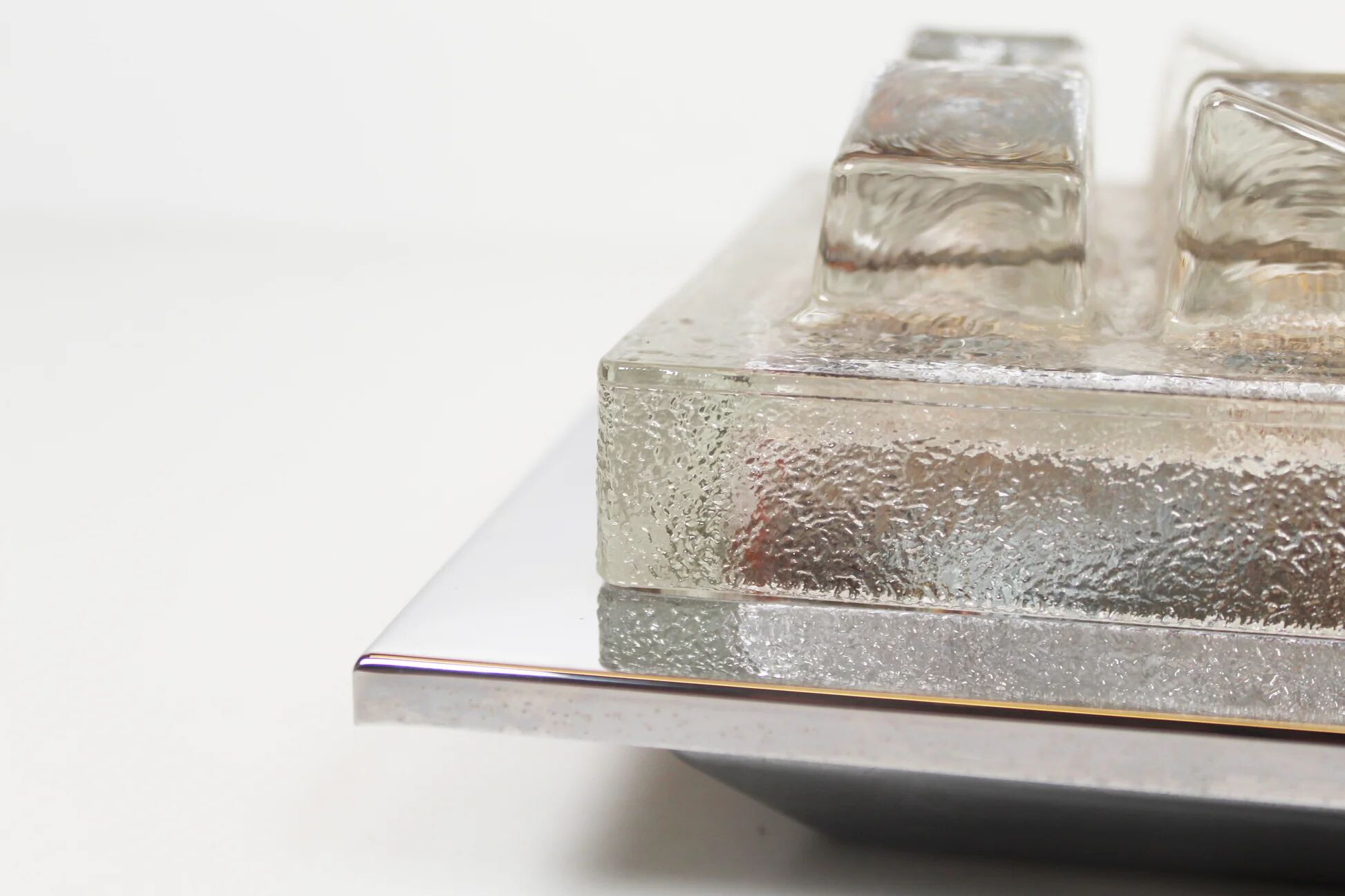 Single 1970s brutalist glass wall sconce by Hillebrand