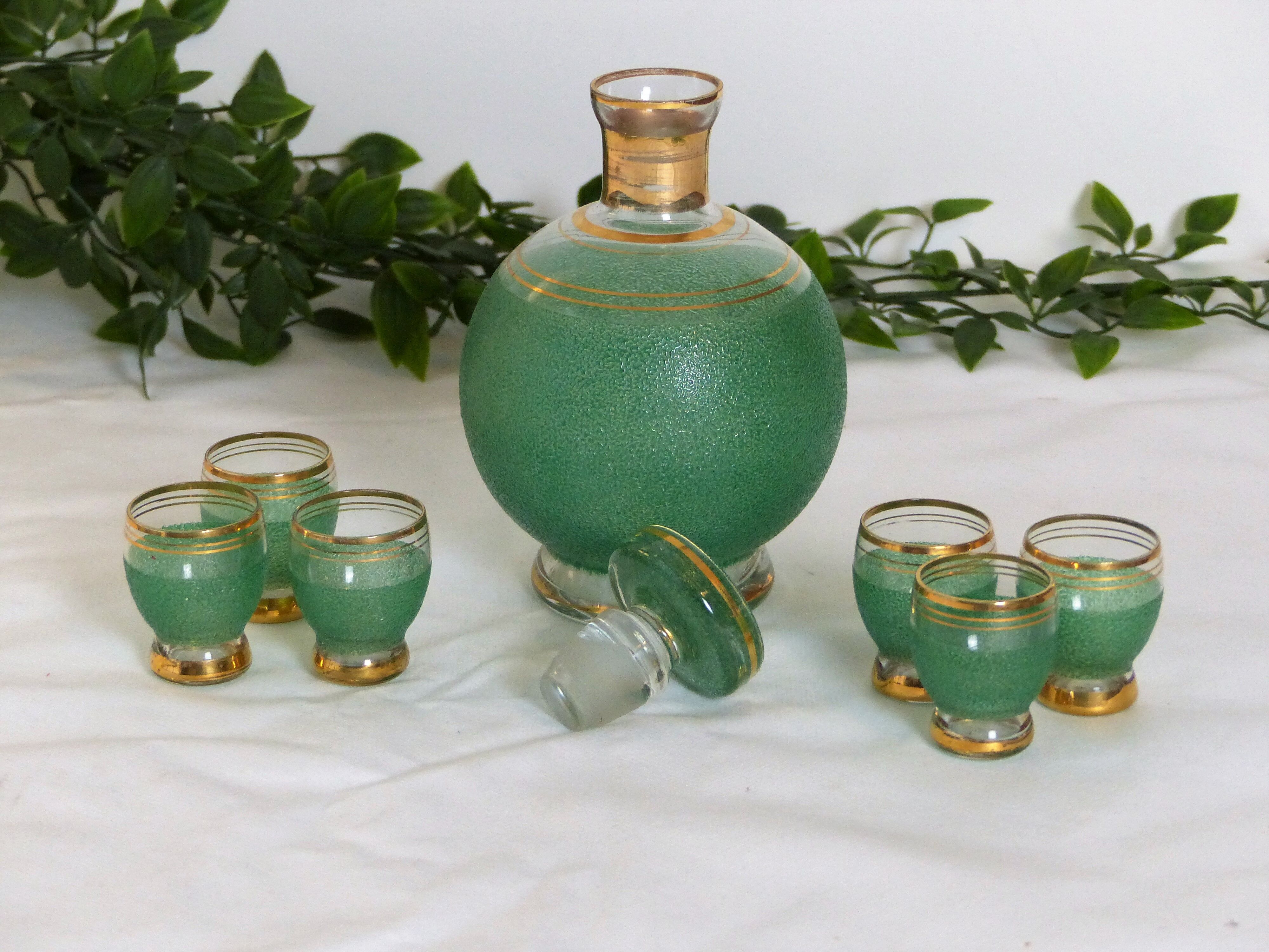 Green liqueur carafe and its 6 glasses