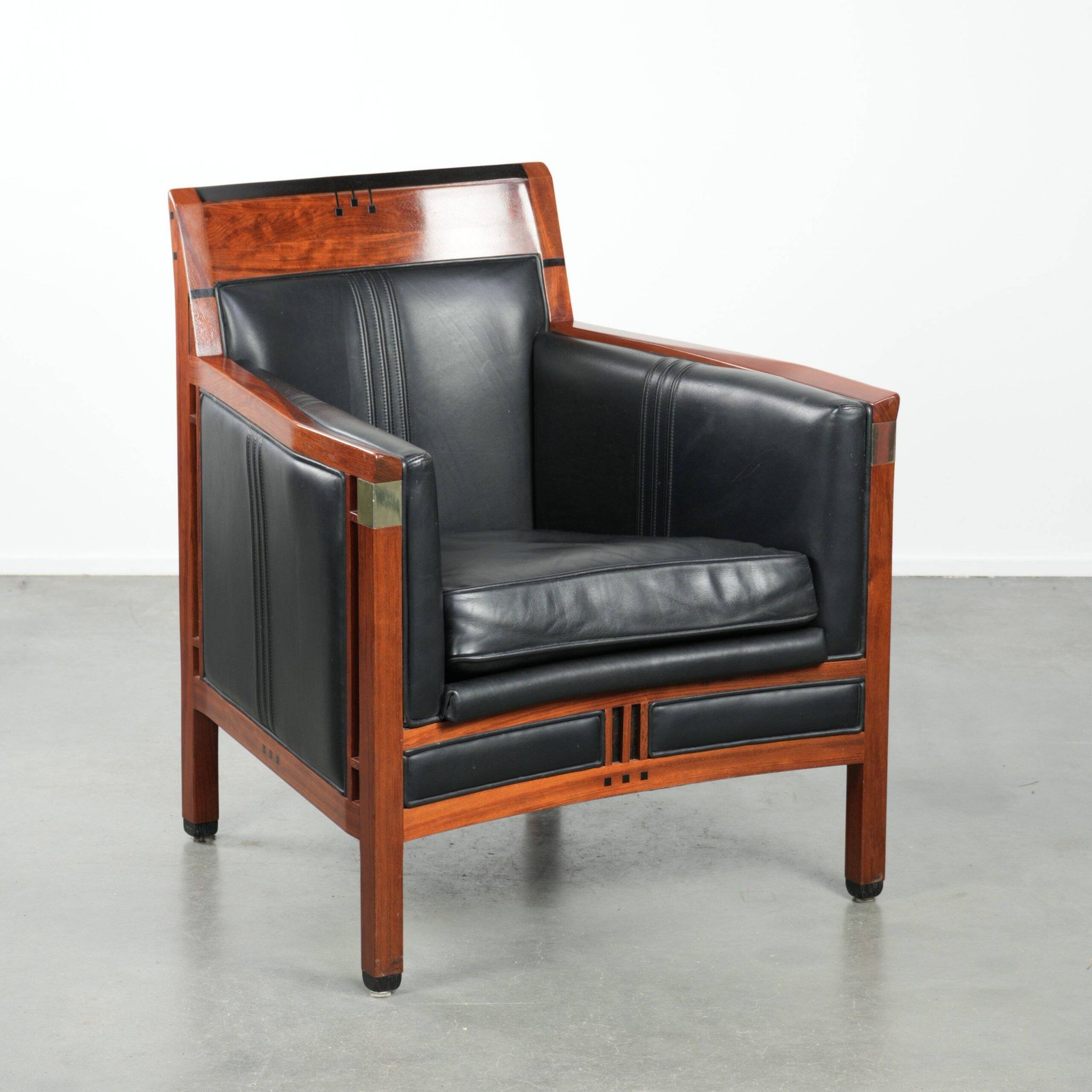 Black leather and wooden Art Deco design armchair