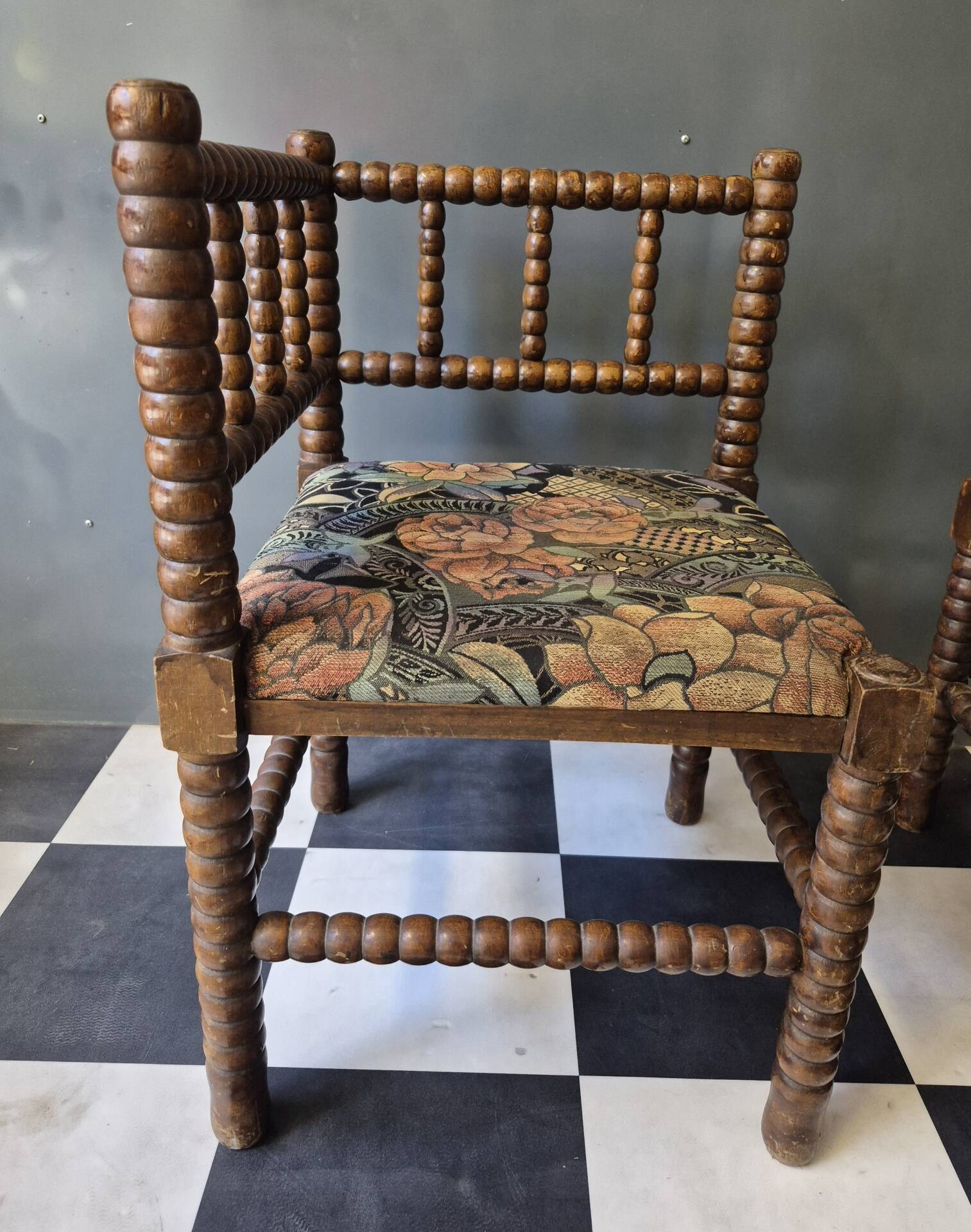 Old pair of corner chairs known as 'fireplace corner' armchairs.