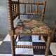 Old pair of corner chairs known as 'fireplace corner' armchairs.