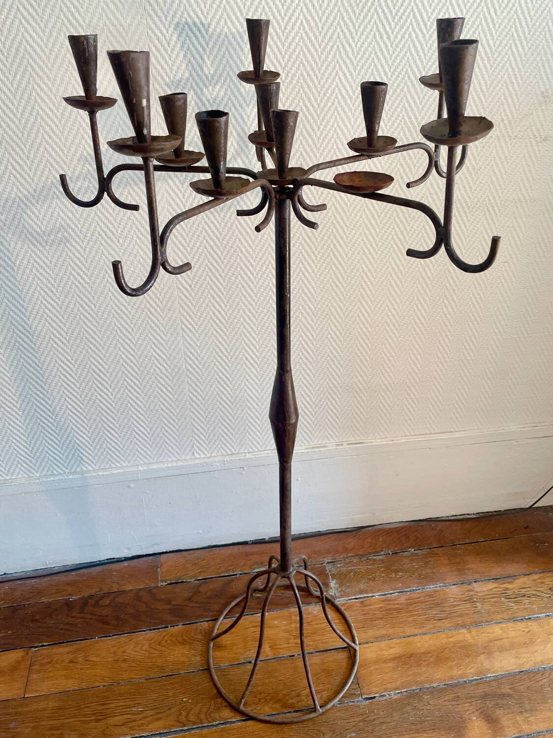 Large standing candlestick in folk art forged metal