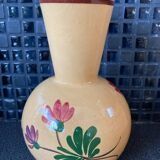 Terracotta vase decorated with flowers