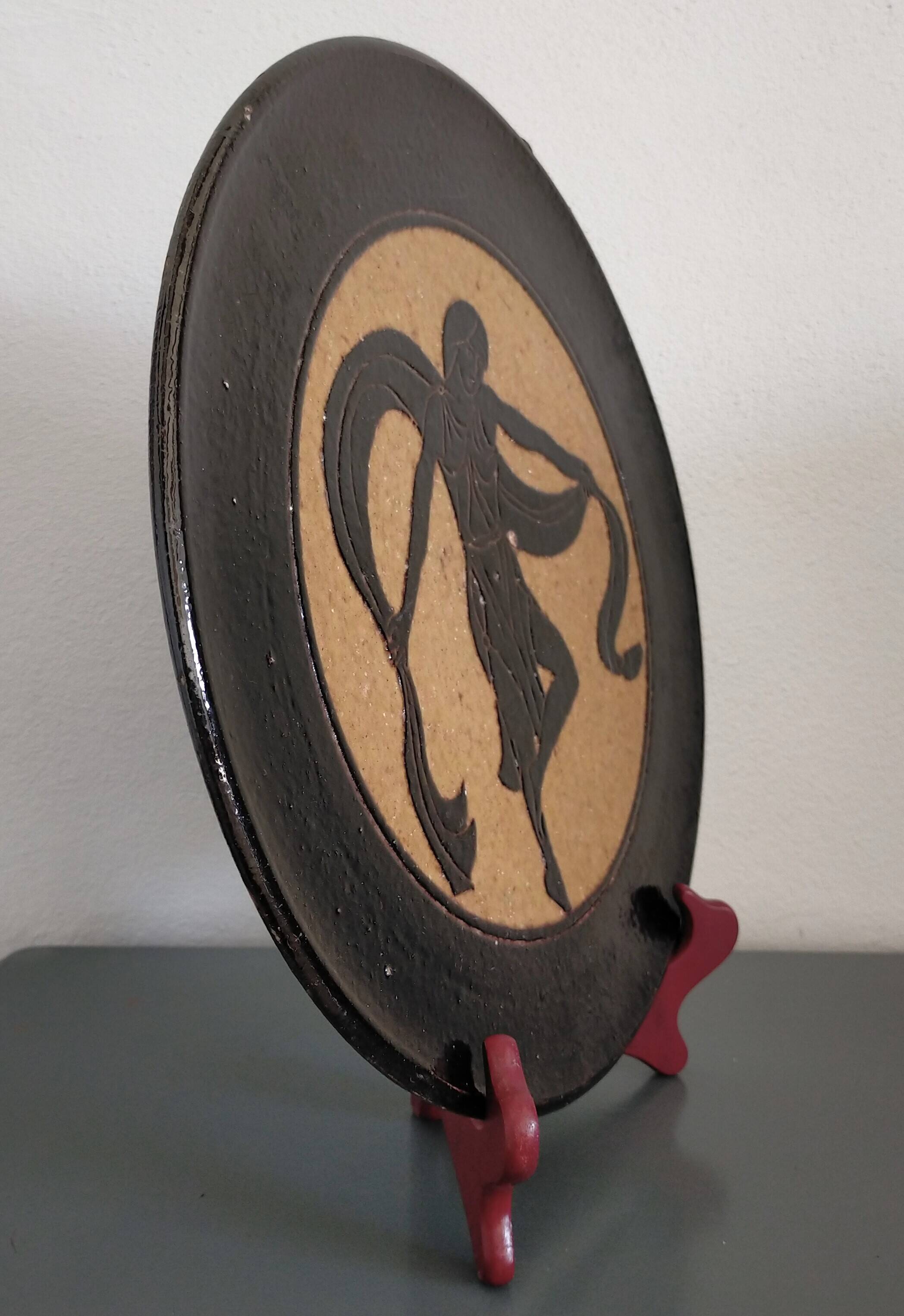 Glazed earthenware dish from Dauphiné signed A.M. Faure 1953