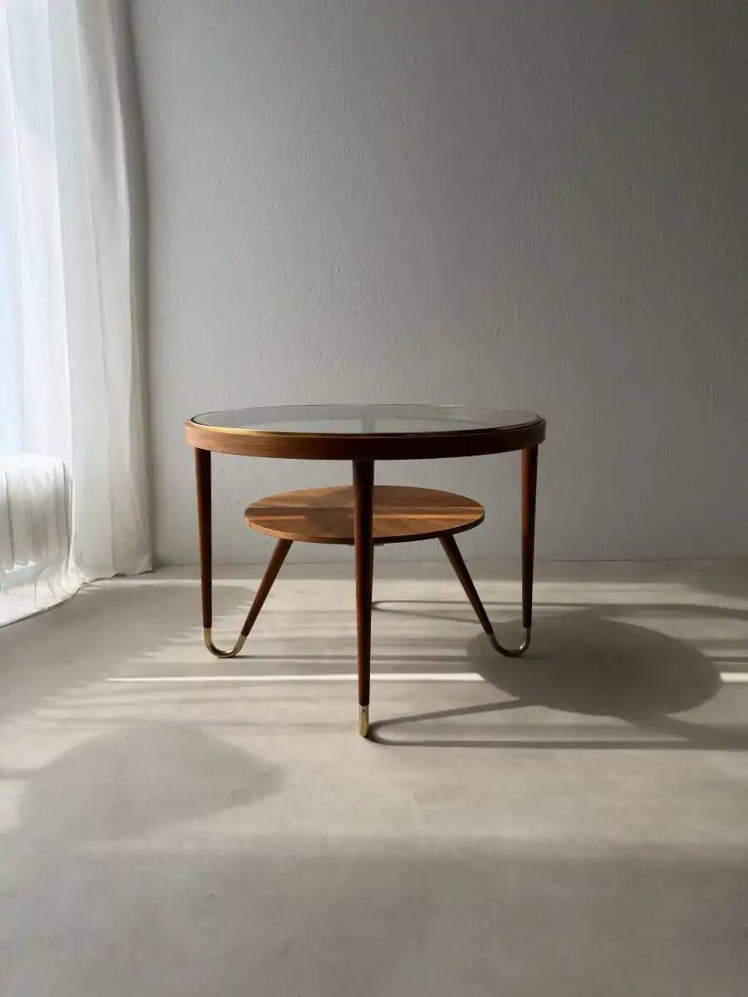 Round walnut coffee table with glass by Ilse Möbel