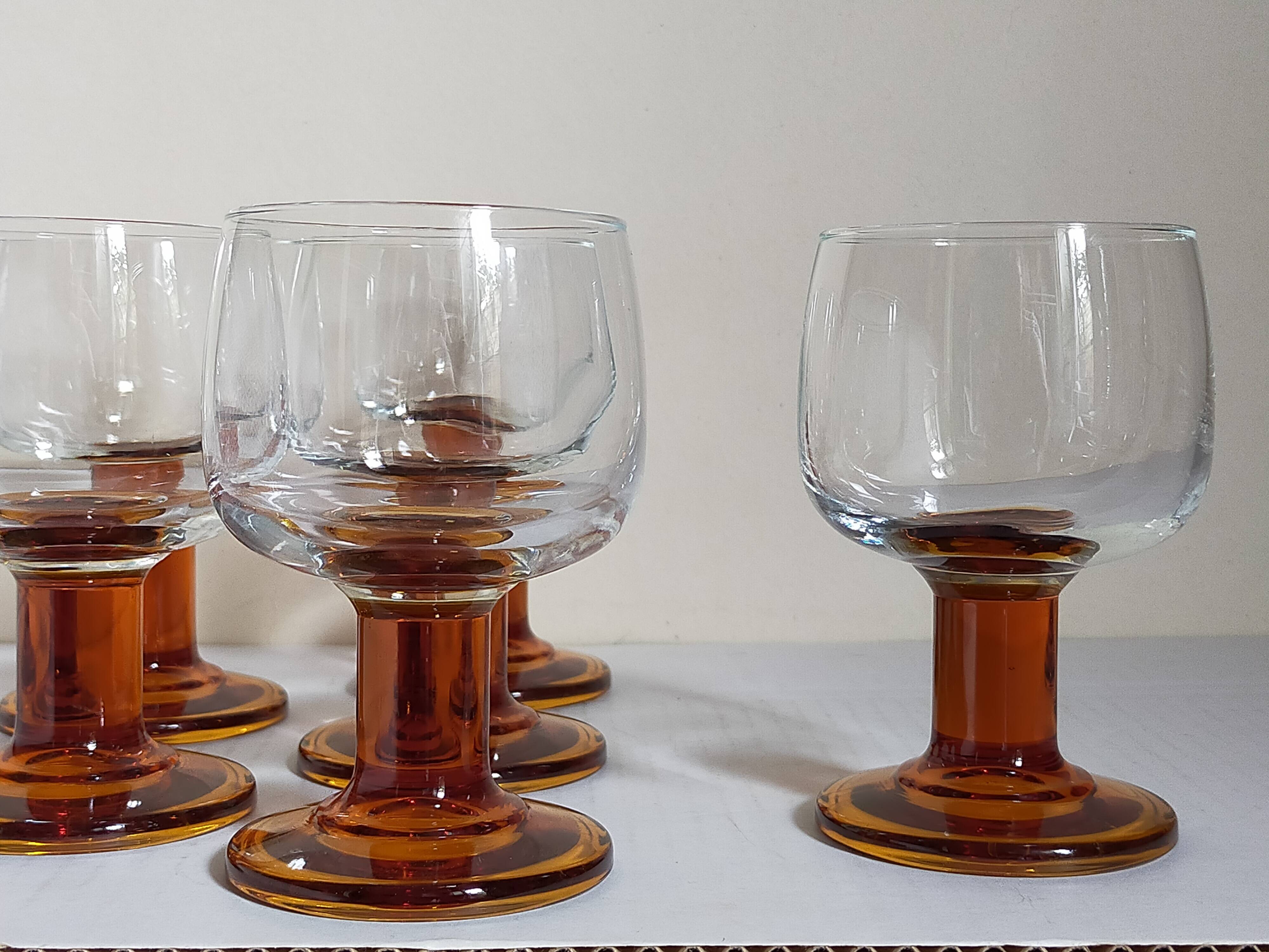 Six amber stemmed glasses from the 70s