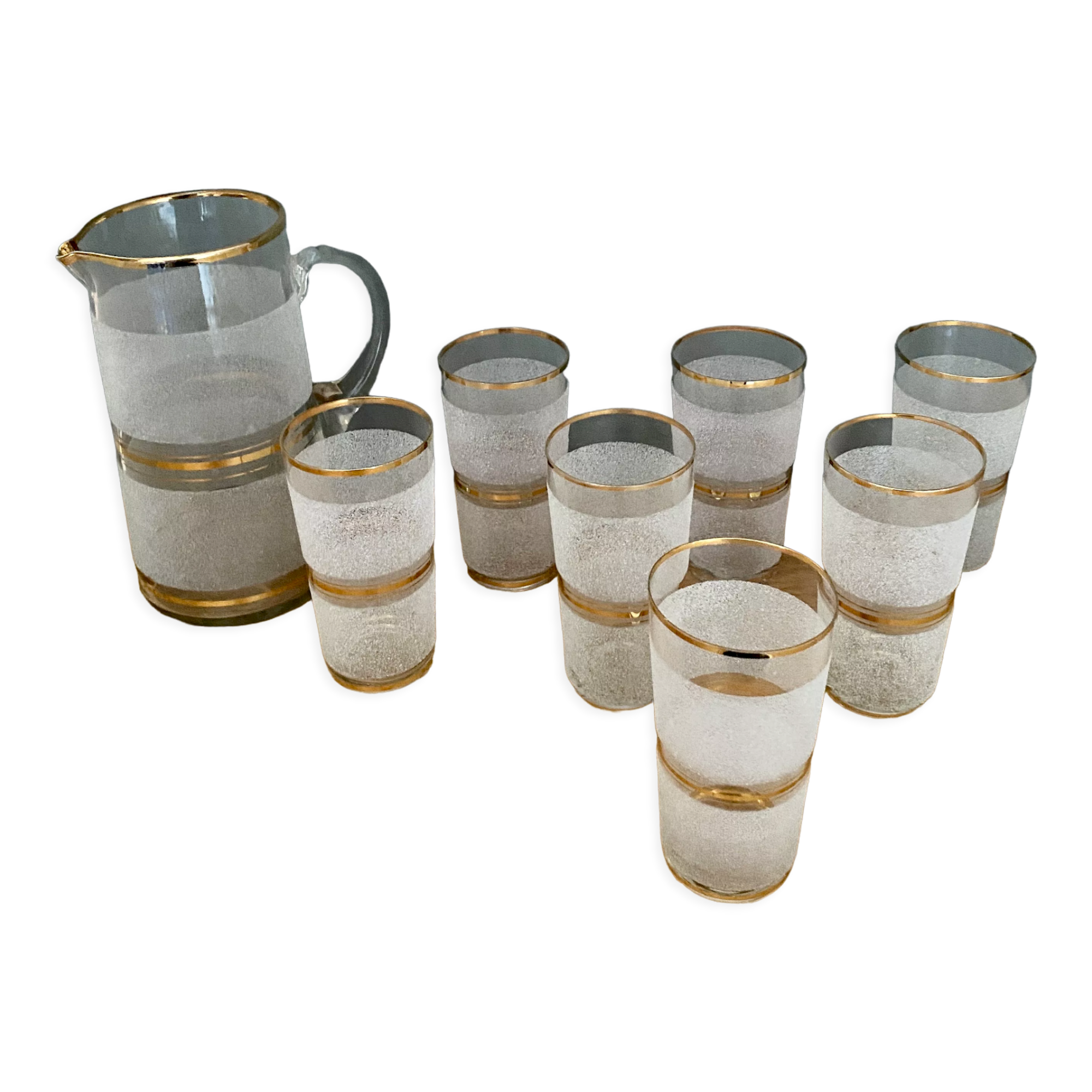 Vintage orangeade service in white granite glass and golden edging