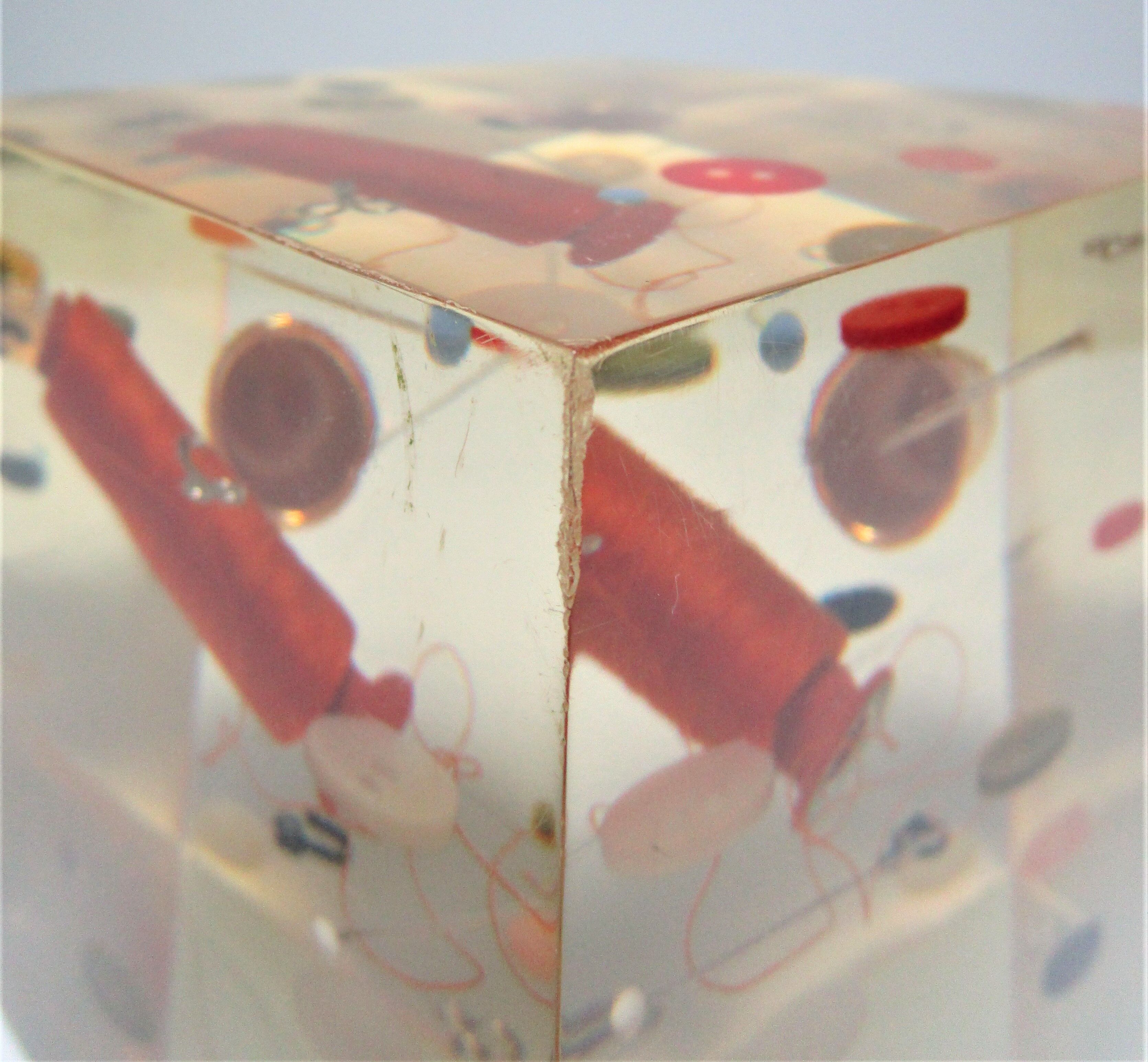 Paperweight sculpture block resin inclusions sewing design 70s