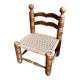 Low chair in dark wood and woven Danish cord attributed to Charles Dudouyt.