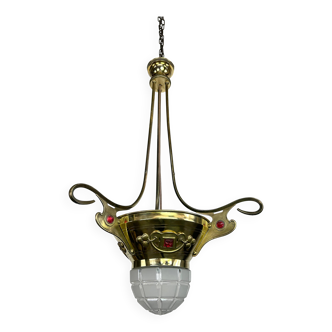 Brass Art Nouveau chandelier with red crystals