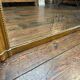 Antique gilded fireplace mirror