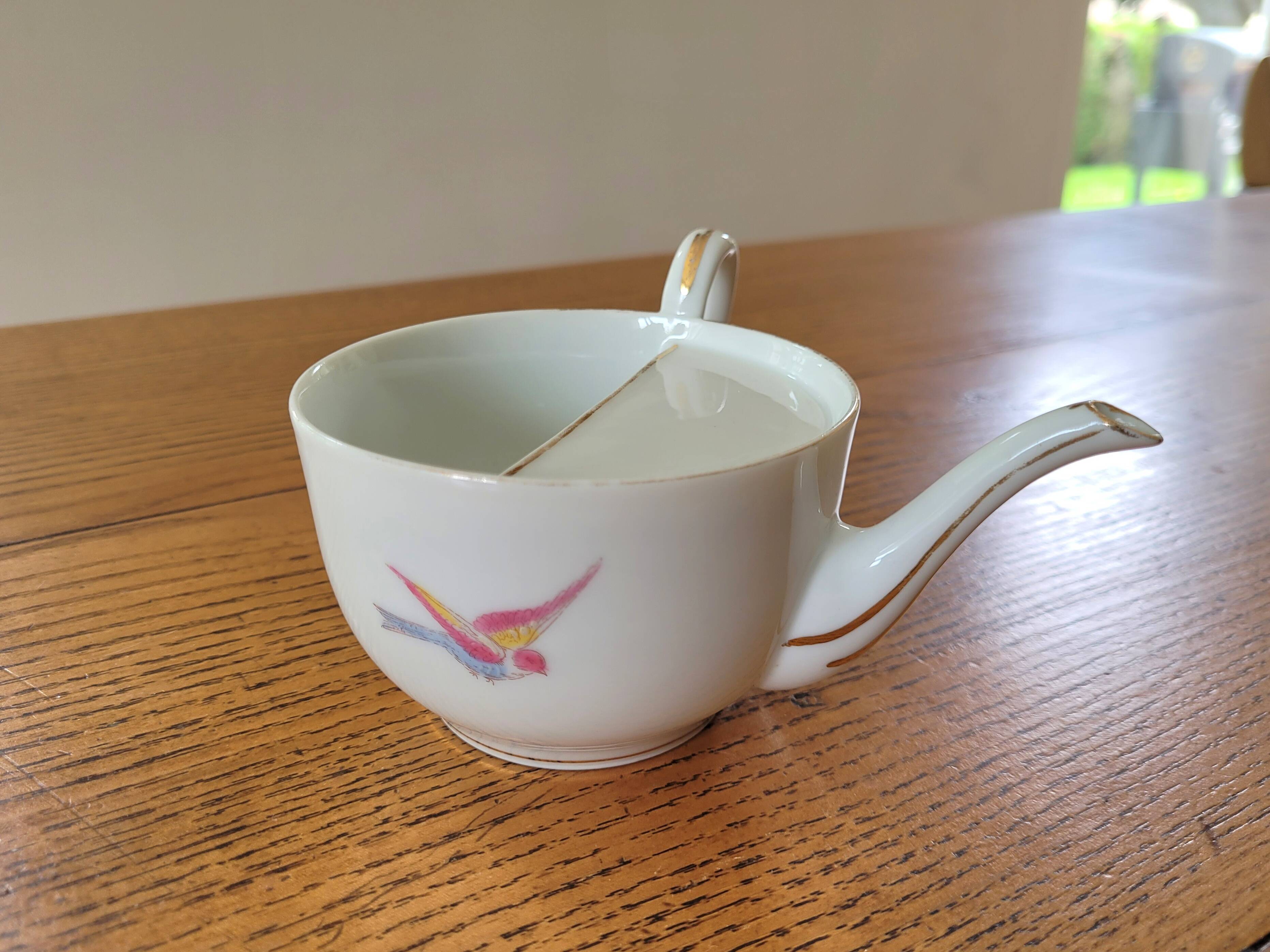 Antique porcelain duck mug for the sick