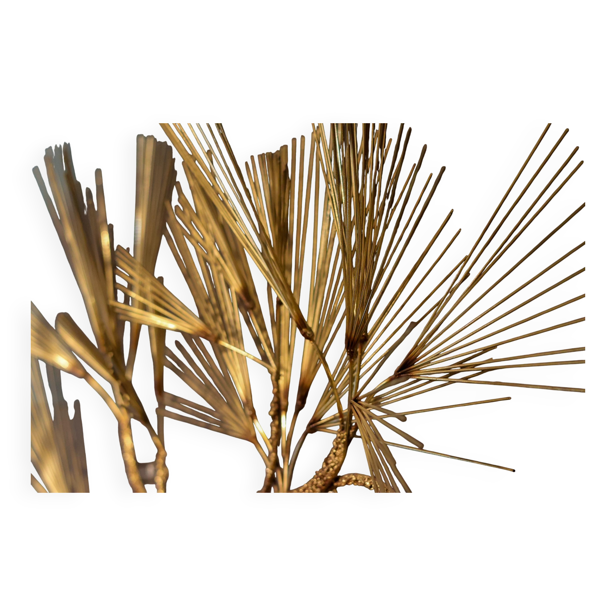 Large wall sculpture in the shape of a tree needle in brass by Curtis Jeré, mid-century modern.