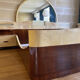 Bed with integrated bedside in rosewood and parchment, art deco period, twentieth century