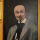 Portrait of a dandy with a moustache from the early 20th century.