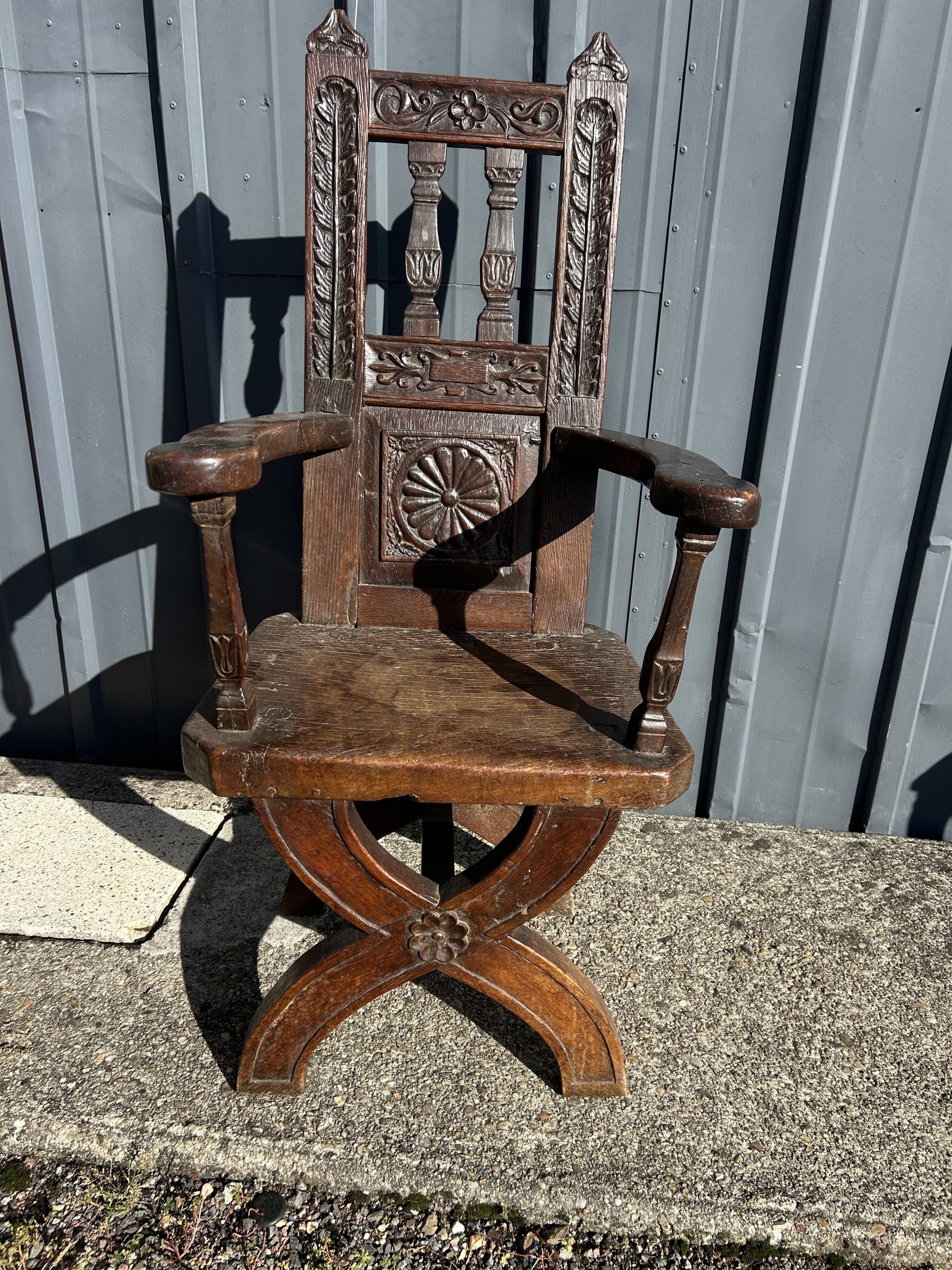 Antique oak armchair, high period
