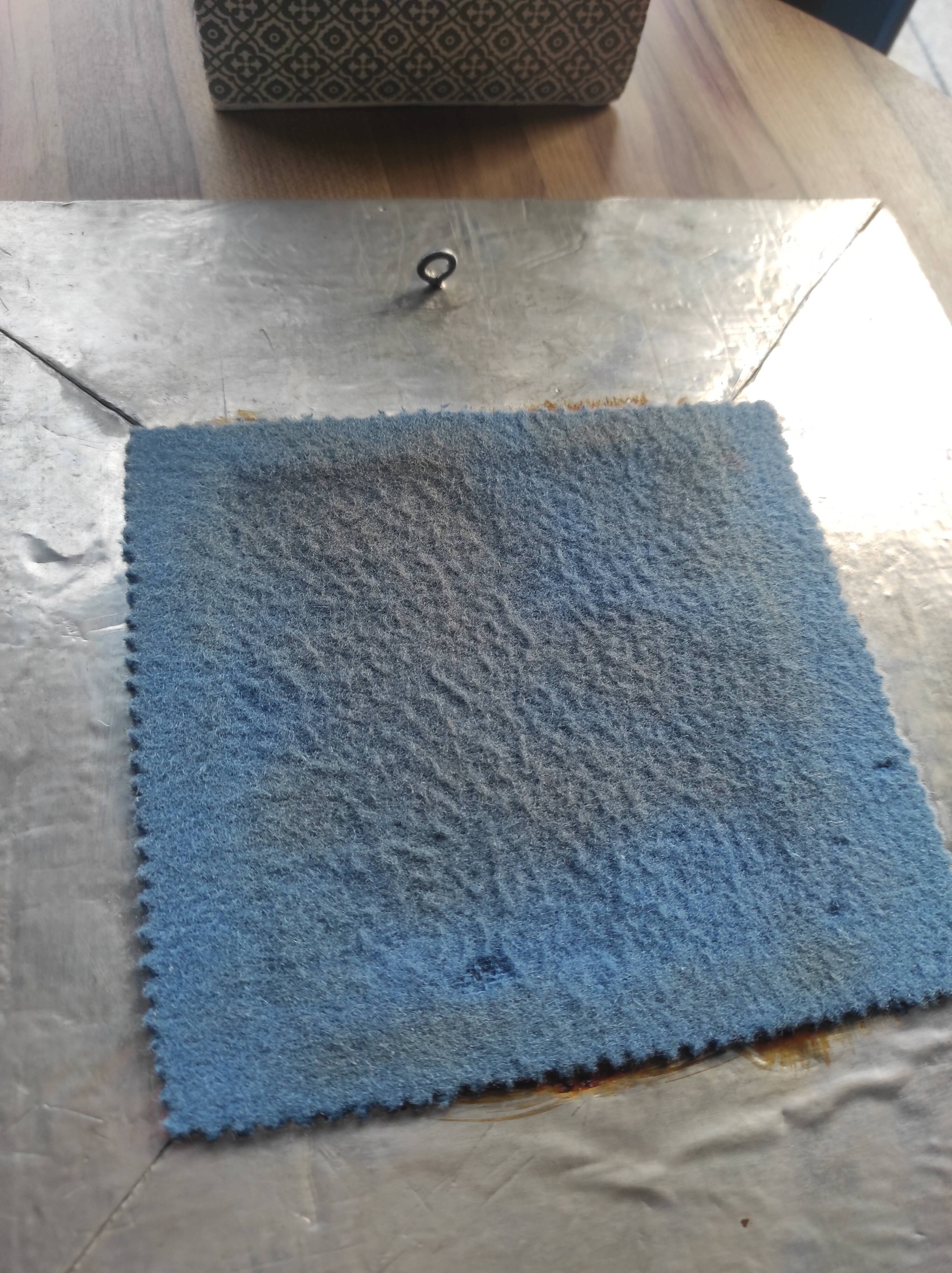 Vintage square mirror in wood covered with metal leaf, moldings in relief