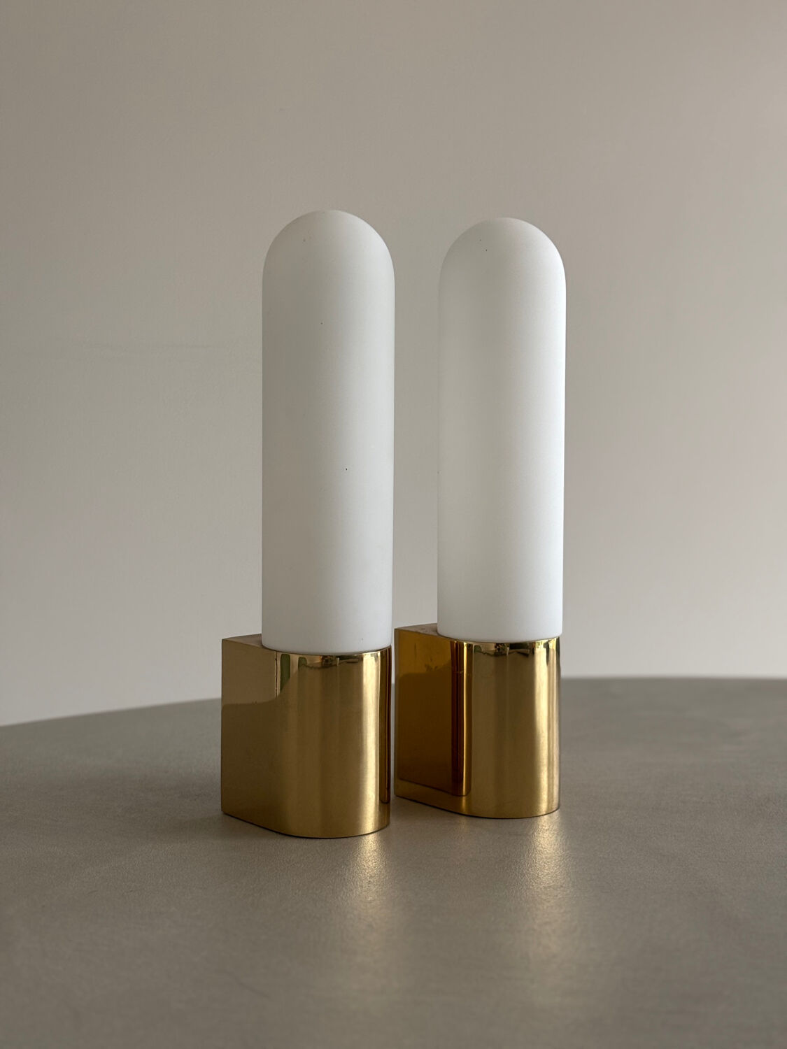 Opaque glass and brass wall light by Limburg, Germany, 1970.