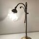 Brass table lamp with a glass shade