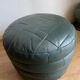 Green patchwork leather pouf from Sède
