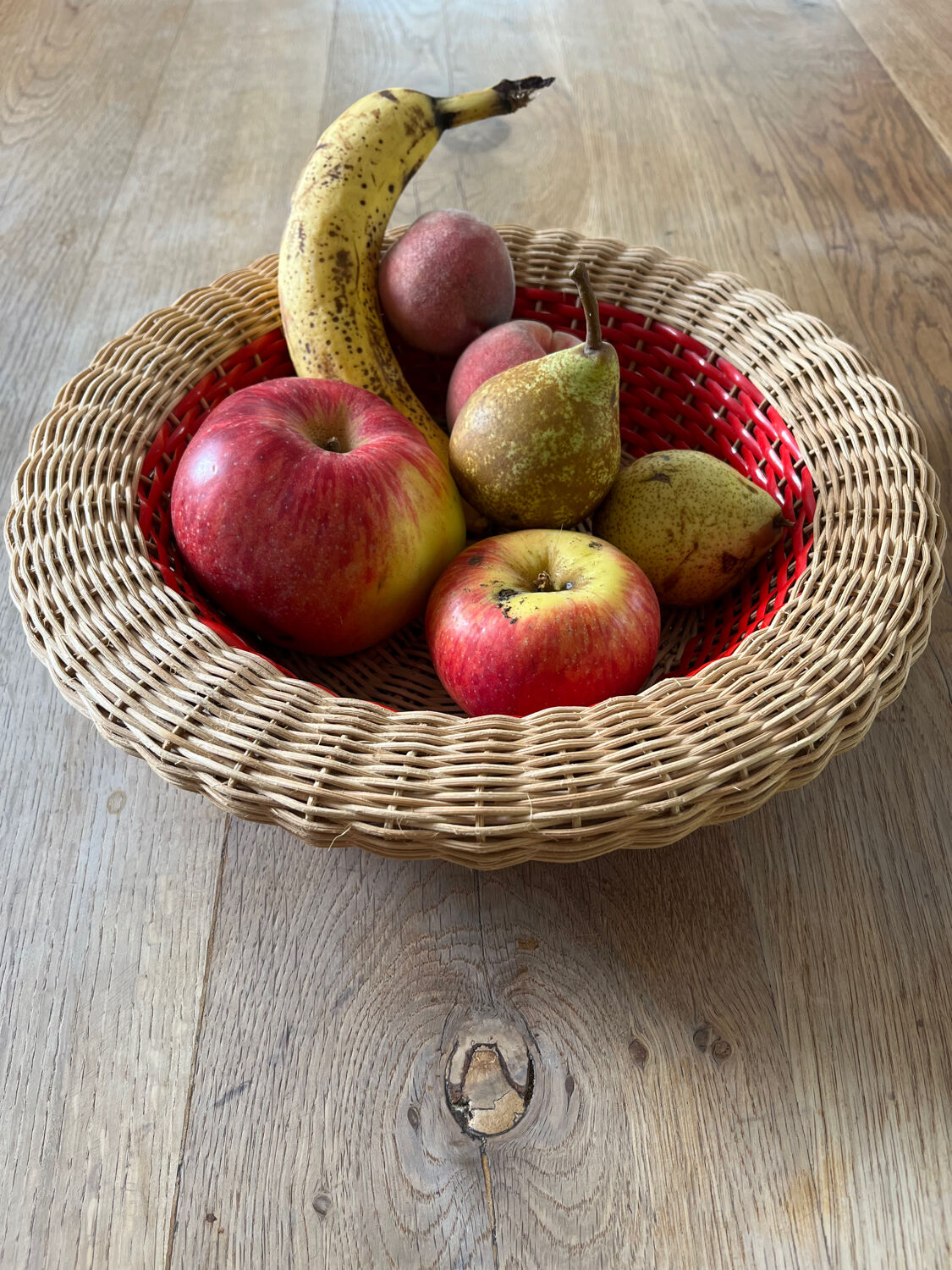 Rattan basket with red trim