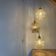 Suspension triple globes vintage en verre ambré bulle