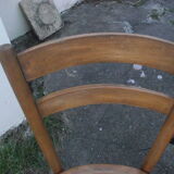 A pair of Lutherma bistro chairs