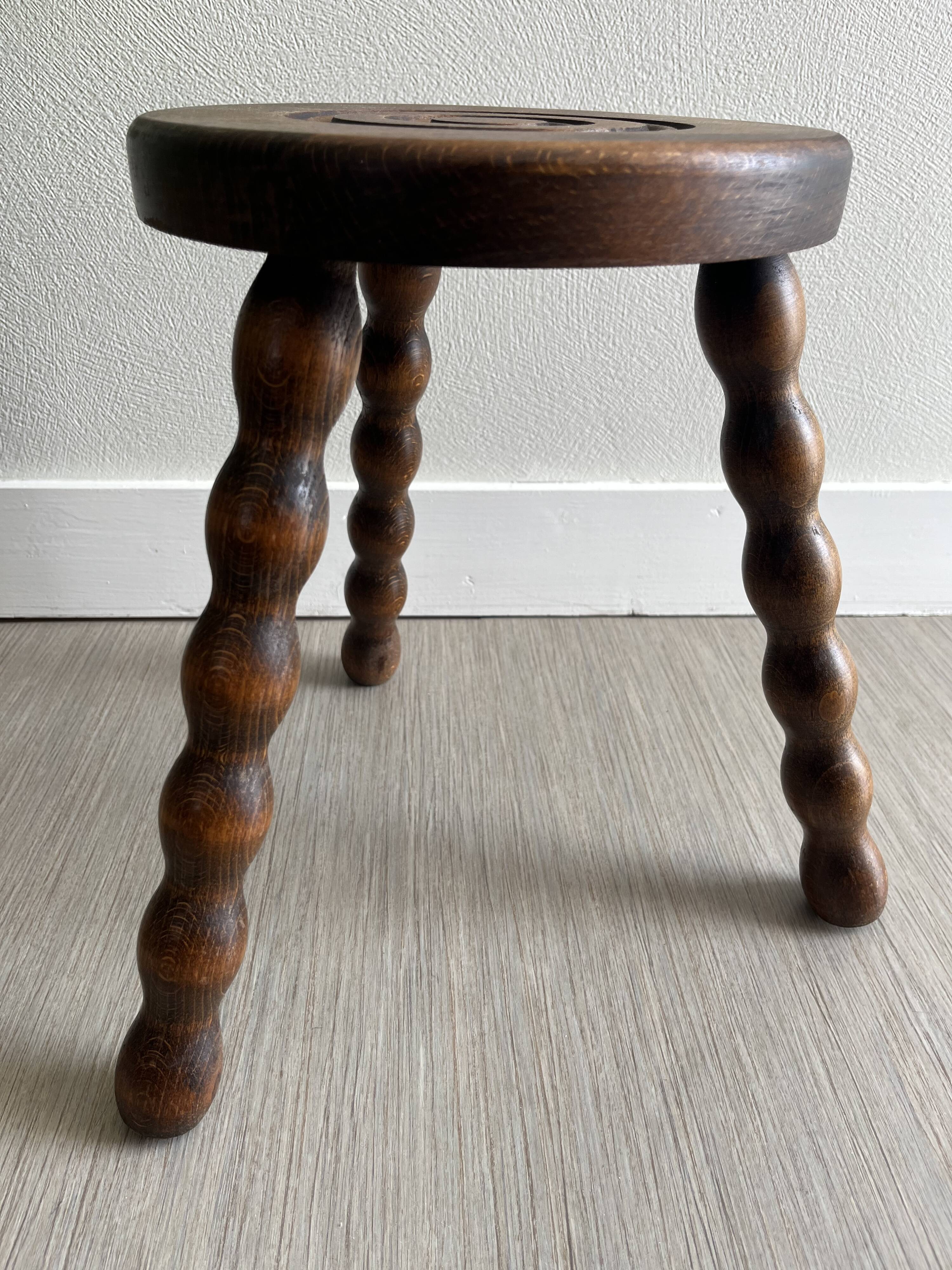 Wooden tripod stool