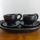 Terracotta service painted in black saucer cups and top