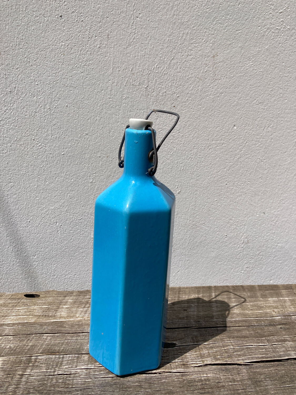 Glazed stoneware bottle signed turquoise blue
