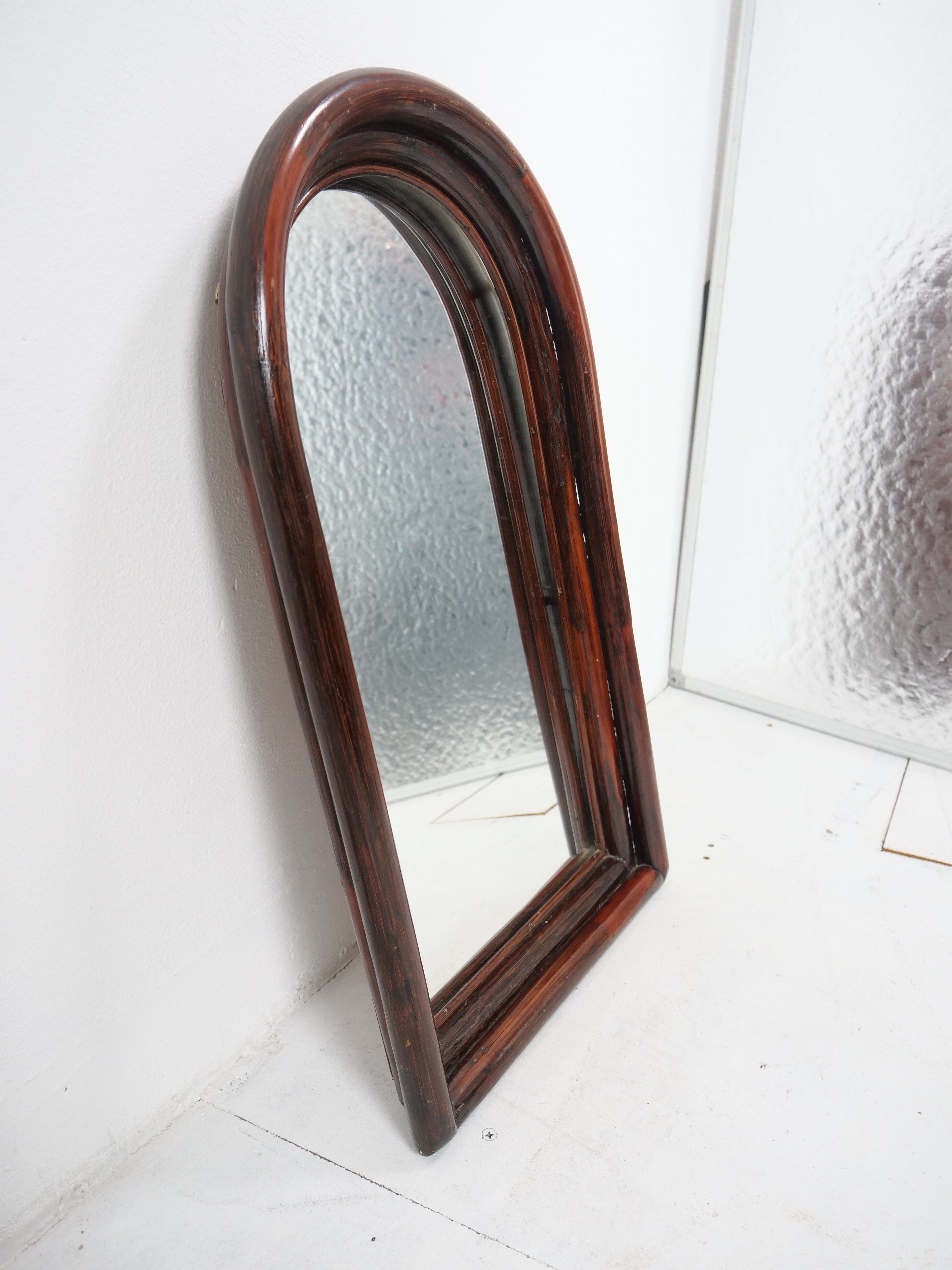 Dark rattan mirror