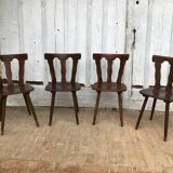 4 wooden chairs with brutalist design