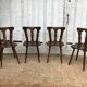 4 brutalist-style wooden chairs