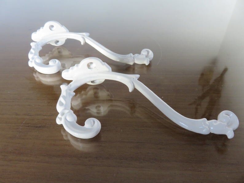 2 white cast iron pads art deco 30s 40s