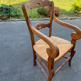 Walnut and straw armchair