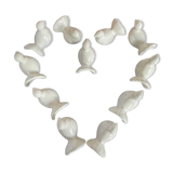 11 zoomorphic ceramic knife rests in white