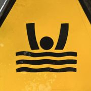 Drowning man danger warning sign vintage european 1980's industrial enamel
