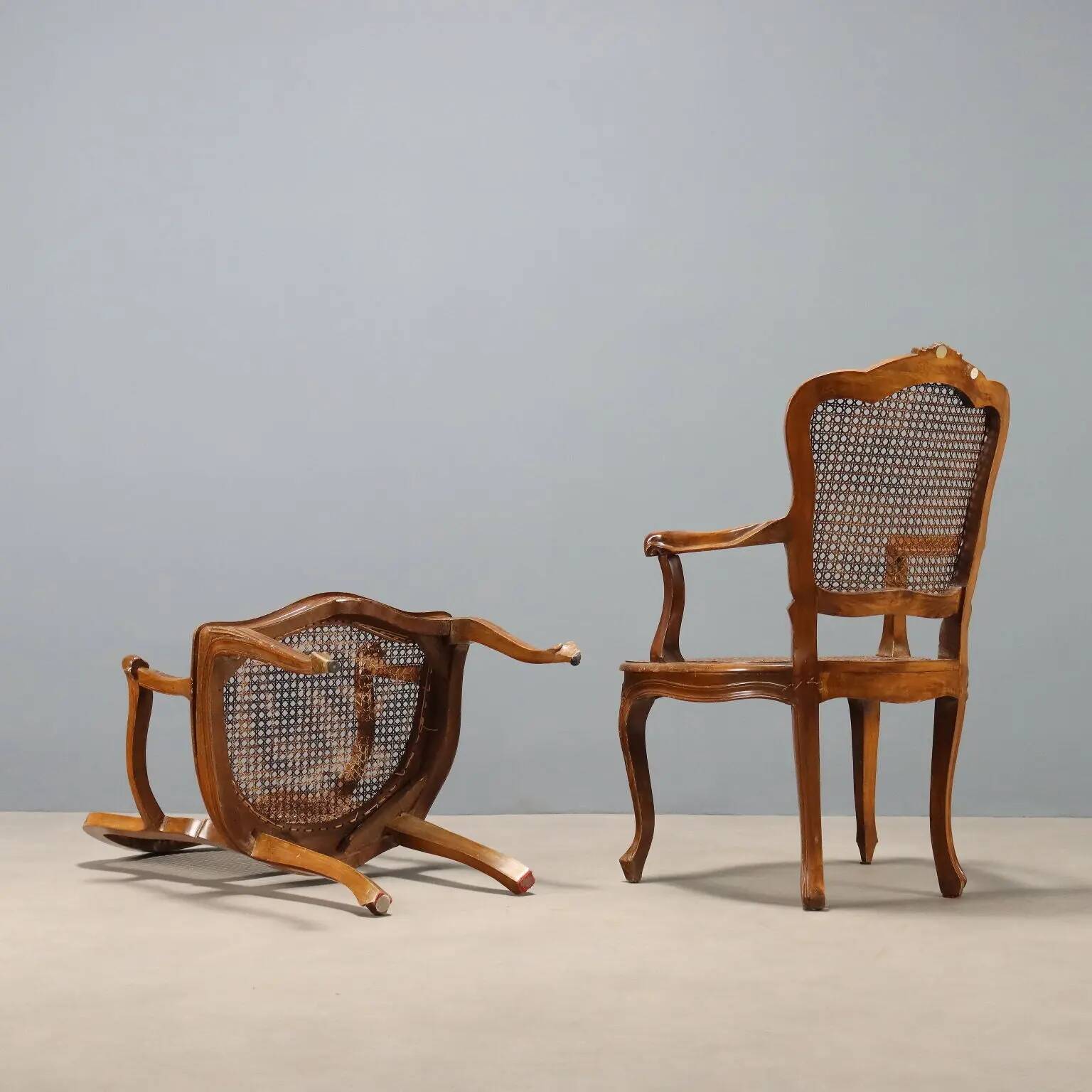 Antique baroque-style armchairs in walnut and fabric, 19th century.