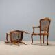 Antique baroque-style armchairs in walnut and fabric, 19th century.