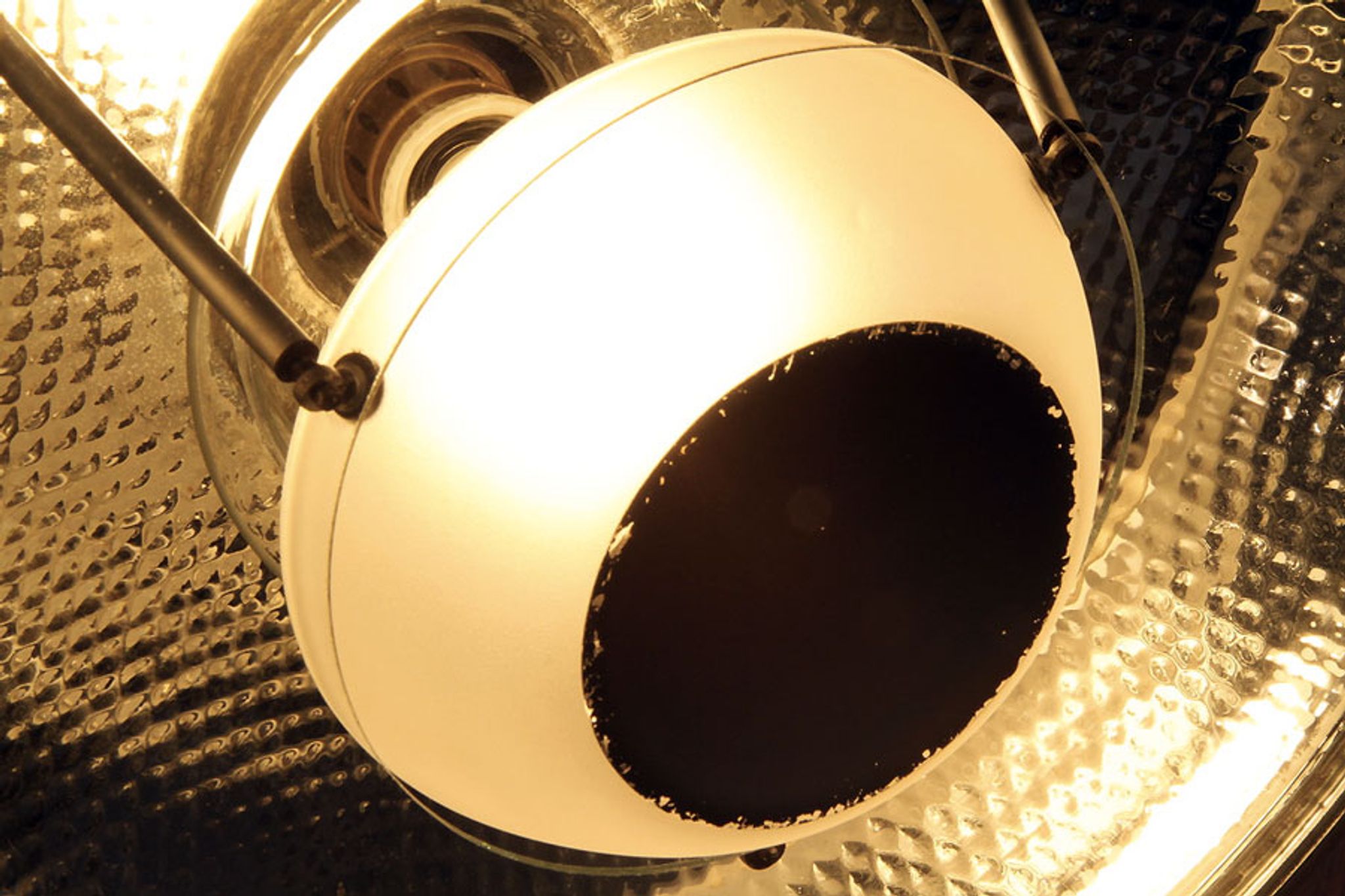 Old Bauhaus lamp in mercurized glass chrome industrial suspension.