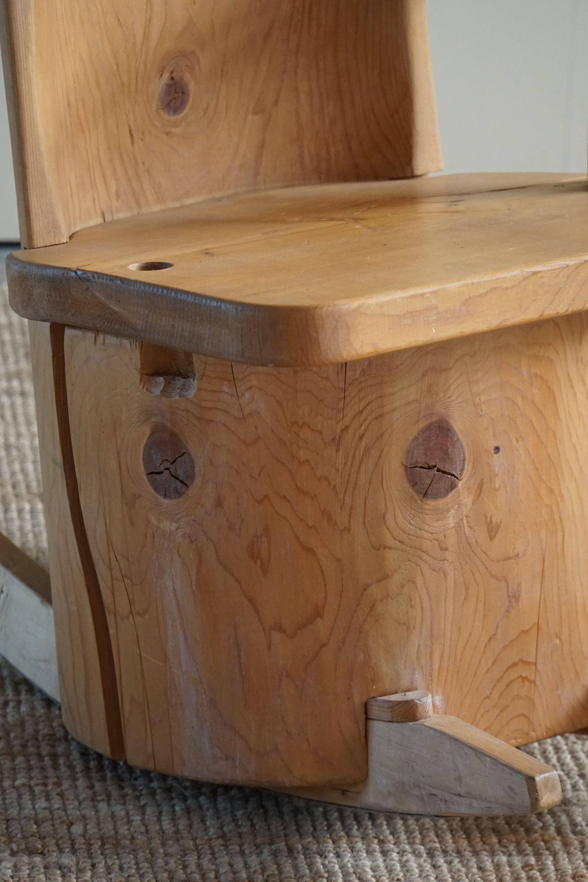 Unique sculptural rocking chair by the Finnish Matti Martikka in solid pine, 1960s.
