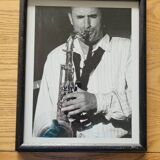 Framed and signed photo of saxophonist musician