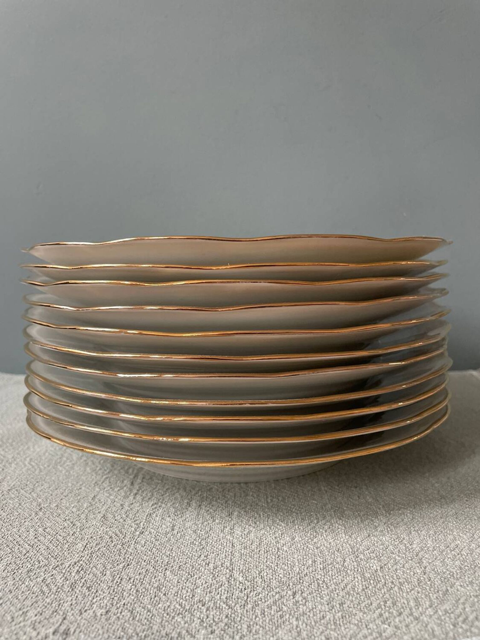 Series of 11 old flat plates in white porcelain and gold edging